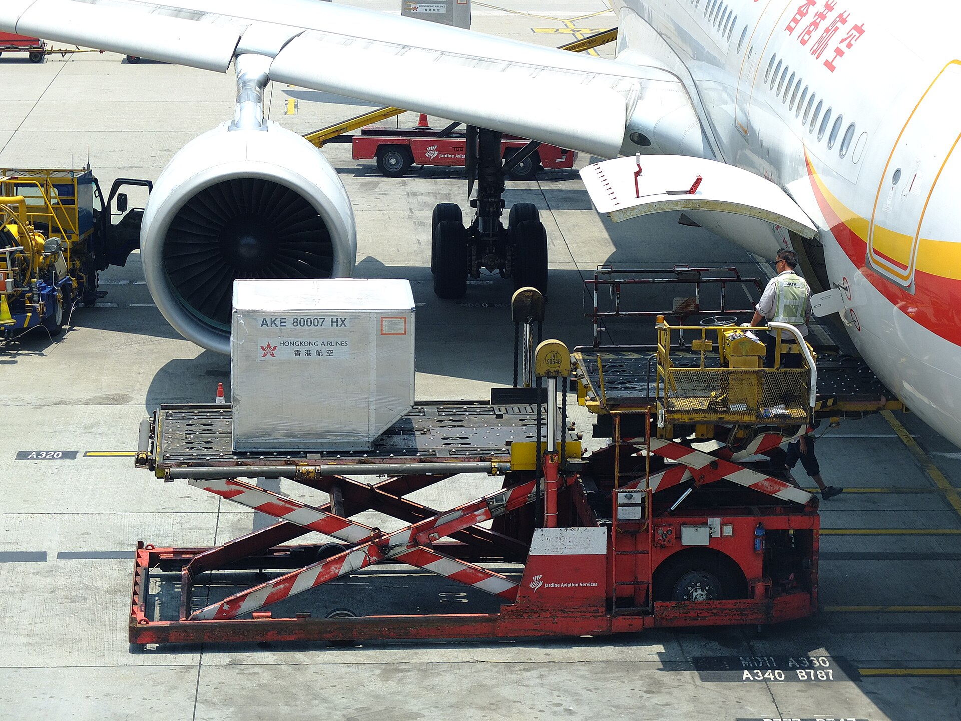 Air cargo container being loaded into a cargo aircraft